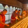 Offering butter lamps