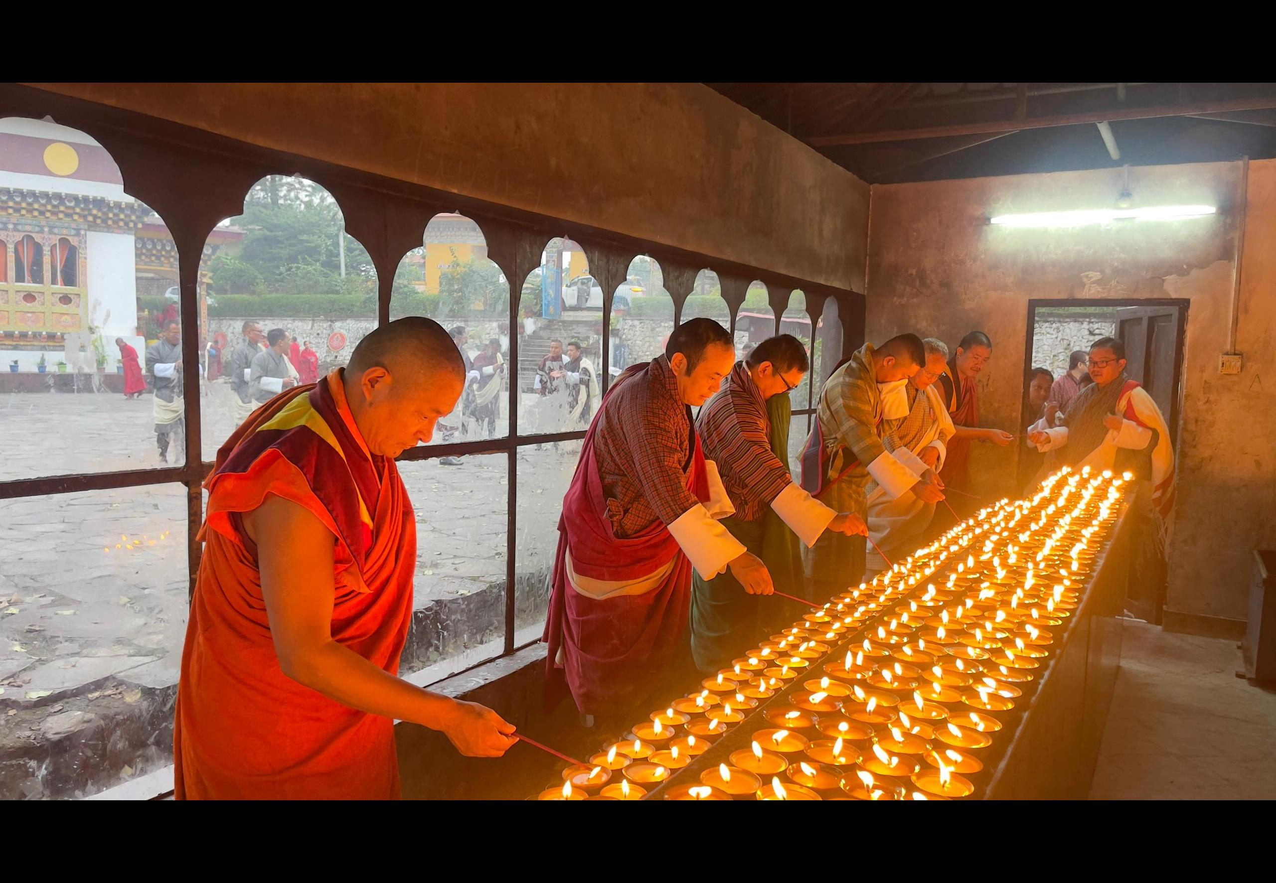 Offering butter lamps